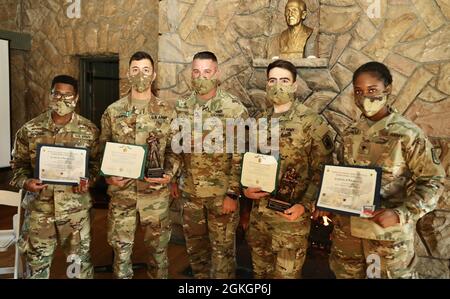 The winners and runners up from the Joint Command Best Warrior Competition, 76th Operational Response Command pose for a photo with Command Sgt. Maj. Robert Potts (center), command sergeant major, 76th ORC, during an awards ceremony held at Camp Williams, Utah, April 17. The winners will go on to compete in the U.S. Army Reserve Command competition later this year. Stock Photo