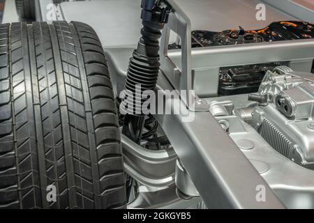 Detailed closeup of the tire and shock absorber of an electric car Stock Photo