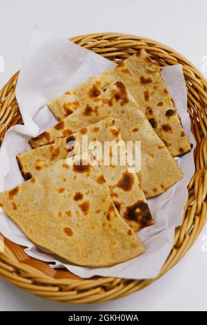tandoori naan bread or roti in a basket, indian clay oven baked bread Stock Photo