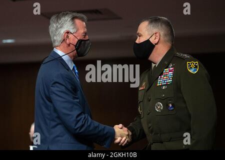 Sen. Tommy Tuberville, R-Ala., speaks with members of the media as he ...