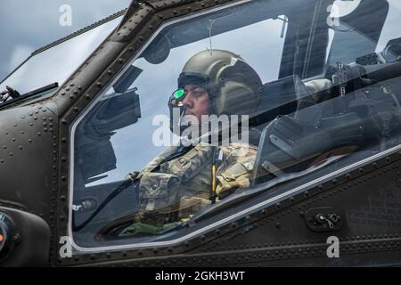 Soldiers of 2-6 Calvary Squadron, 25th Combat Aviation Brigade were afforded the unique opportunity of an orientation AH-64D Apache flight with our Squadron senior Instructor Pilots on Wheeler Army Airfield, Hawaii. These Soldiers work diligently every single day to ensure the readiness of our Apaches. Stock Photo