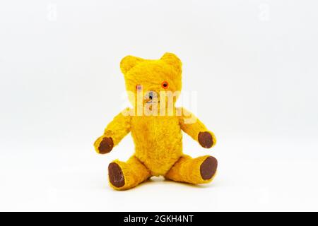 old 1960s teddy bear on white studio background Stock Photo