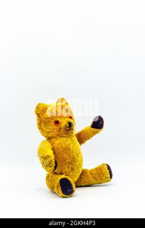 old 1960s teddy bear on white studio background Stock Photo