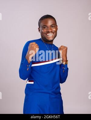 handsome young black man celebrating Stock Photo