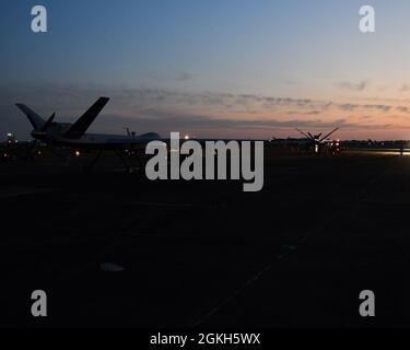 Members of the 147th Attack Wing Maintenance Squadron attach the tail ...