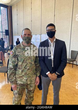 Sgt. Maj. of the Army, Command Sgt. Maj. Michael Grinston takes a moment to share a photo with Pfc. Elijah Clarke, a multi-channel systems operator maintainer assigned to the 94th AAMDC during the People First Solarium at U.S. Military Academy West Point from March 15-19, 2021. Stock Photo