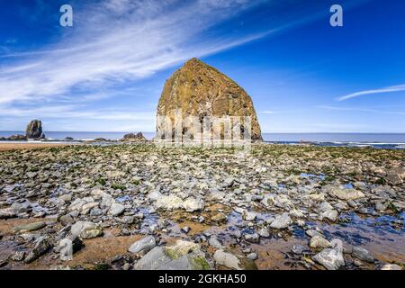 The Haystack Rock on the Cannon Beach, Ecola State Park, Oregon Stock Photo