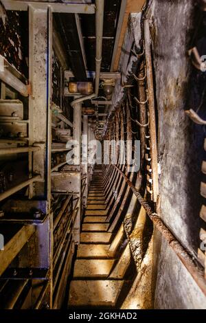 Old technical maintenance tunnel in the subway. Stock Photo