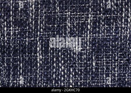 Texture backdrop photo of dark blue colored denim cloth. Stock Photo