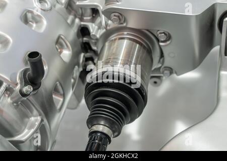 Detailed closeup of an electric car motor component connected with the engine Stock Photo