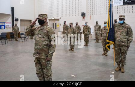 U.S. Army Command Sgt Maj. Andrew Lampkins, the incoming CSM of the 106th Regiment (Regional Training Institute), assumes responsibility of the unit during a change of responsibility ceremony at Camp Smith Training Site, Cortlandt Manor, N.Y., April 24, 2021. Stock Photo
