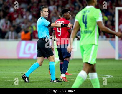 Lille France September 14 Referee Danny Makkelie Shows A Yellow Card During The Uefa Champions League Match Between Losc Lille And Vfl Wolfsburg At Stade Pierre Mauroy On September 14 2021 In