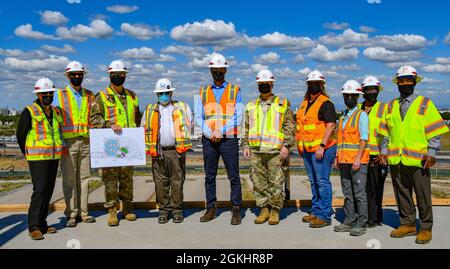 Sacramento District leaders and members of the project delivery team for the VA Stockton medical complex project pose for a picture on top of the Community Based Outpatient Clinic in Stockton, California April 26, 2021 with Stockton mayor Kevin Lincoln, center. The mayor visited the site after being elected in November 2020 to get a firsthand look at one of the largest federal projects in the area and discuss progress with district leaders. Veterans in the city of Stockton and the Central Valley will benefit greatly from the completed VA Community Based Outpatient Clinic and Community Living C Stock Photo