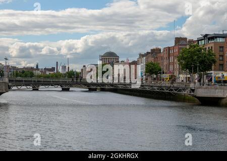 Footbridges and bridges across the River Liffey in central Dublin Stock Photo