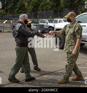 Vice Adm. Doug Perry, Commander, U.S. 2nd Fleet, is greeted by Rear Adm ...