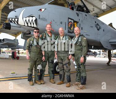 Maj. Gen. Brian K. Borgen, the 10th Air Force Commander, poses with the three other members of the 4-ship sortie — left to right: Maj. Chad “Zero” Carlton, Lt. Col. Rick “McGraw” Mitchell, and Lt. Col. Anthony “Crack” Roe — after his final flight with the 442d Fighter Wing April 27, 2020, on Whiteman Air Force Base, Mo. Borgen is a former 442 FW commander. Stock Photo