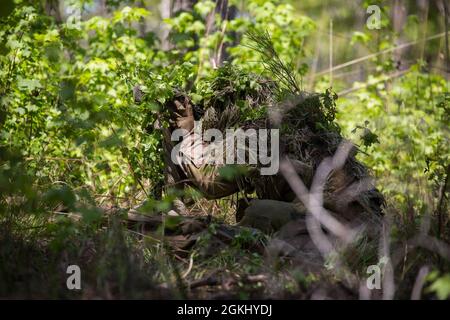 Marine Raiders train in stalking and concealment while attending the ...