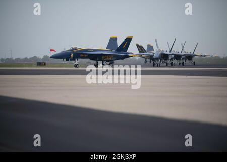 CORPUS CHRISTI, Texas (April 29, 2021) Cmdr. Brian Kesselring, commanding officer and flight leader of the Navy Flight Demonstration Squadron, the Blue Angels, leads the team across Naval Air Station Corpus Christi flight line in F/A-18E Super Hornets after landing on base April 29 ahead of Wings Over South Texas Air Show, scheduled May 1-2. The 2021 show season is Blue Angels' first year flying the F/A-18 Super Hornet platform as well as the 75th anniversary of the team. Stock Photo