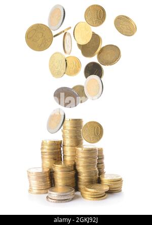 Many euro coins falling on white background Stock Photo - Alamy