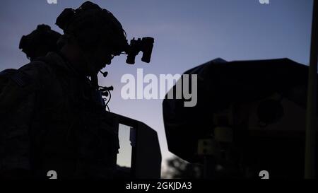 A Marine Raider prepares to complete a raid during a RAVEN unit readiness exercise in Nashville, Tenn., Apr. 30, 2021. RAVEN is a training exercise held to evaluate all aspects of a Marine Special Operations Company prior to a Marine Forces Special Operations Command deployment. Stock Photo