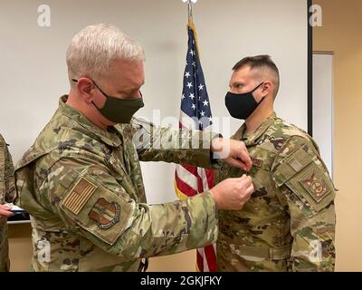 Col. Carl Magnusson, 914th Air Refueling Wing commander, poses next to ...