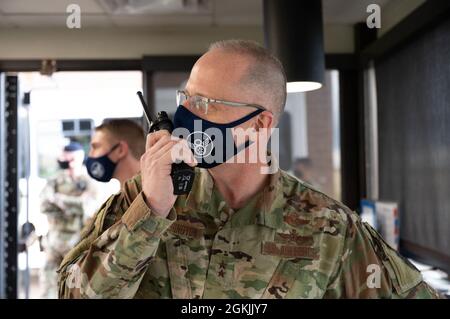 Maj. Gen. Mark Weatherington, 8th Air Force and Joint-Global Strike Operations Center commander, embeds with defenders from the 28th Security Forces Squadron and helps navigate his teammates through a gate-runner exercise at Ellsworth Air Force Base, S.D., May 4, 2021. Ellsworth conducts numerous exercises intended to promote both base safety and mission readiness. Stock Photo