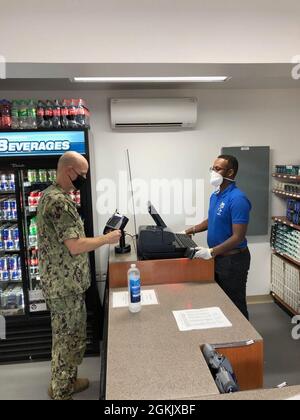 NEX Djibouti opened its CLU Mart on May 7, 2021.  The new CLU Mart is located near the Containerized Living Unit (CLU) housing on base.  The new cashless CLU Mart is staffed 24 hours a day and offers quality of life consumable items to the community in Djibouti. The Navy Exchange Service Command (NEXCOM) is comprised of 14,000 personnel worldwide facilitating six business lines, NEX retail stores, the Navy Lodge Program, Telecommunications Program, Navy Clothing and Textile Research Facility, Ships Store Program and the Uniform Program Management Office. Stock Photo