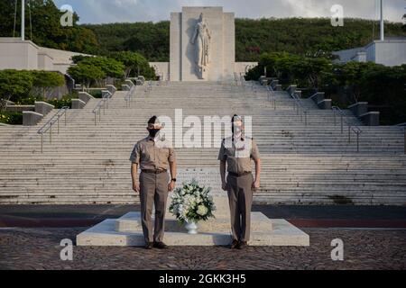 From left to right, Regimental Sgt. Maj. Ralph Martinez, the Chaplain Corps senior enlisted advisor, and Maj. Gen. Tom Solhjem, U.S. Army chief of chaplains, poses for a photo at the National Memorial Cemetery of the Pacific May 11 at Punchbowl Crater in Honolulu, Hawaii. Solhjem and Martinez cemetery visit was to honor the memory of the nation’s military veterans and learn about previous chaplains that have sacrificed their lives during the wars. Stock Photo