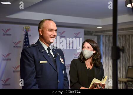 Lt. Gen. Eric Fick, F-35 Joint Program Executive Officer, talks with Laura Seal, F-35 Public Affairs Lead, before speaking during the virtual McAleese Conference in Arlington, Va. The F-35 Joint Program Office is the Department of Defense's focal point for the 5th generation strike aircraft for the Navy, Air Force, Marines, and our allies. The F-35 is the premier multi-mission, 5th generation weapon system. Its ability to collect, analyze and share data is a force multiplier that enhances all assets in the battle-space: with stealth technology, advanced sensors, weapons capacity, and range. Th Stock Photo