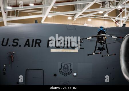 The 911th Maintenance Squadron facilitated a test of an autonomous aircraft inspection in coordination with an AFWERX small business partner at the Pittsburgh International Airport Air Reserve Station, Pennsylvania, May 15, 2021. AFWERX is the Air Force's team of innovators who encourage and facilitate connections across industry, academia, and the military to create and foster a culture of innovation. Stock Photo