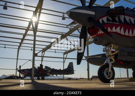 Colombian Air Force A-29B Super Tucanos are parked on the flightline after completing a Red Flag-Rescue training mission that was led by the Colombian Air Force at Davis-Monthan Air Force Base, Ariz., May 15, 2021. Red Flag-Rescue gave U.S. and allied military partners the opportunity to hone their high-end readiness as they focused on combat search and rescue planning. Stock Photo