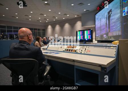 Acting Secretary of the Air Force John P. Roth listens to a presentation in the Morrell Operations Center at Cape Canaveral Space Force Station, Fla., May 17, 2021. During his visit, Roth toured several facilities on CCSFS and met with Airmen and Guardians supporting space launch operations. Stock Photo