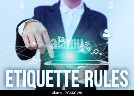 Sign displaying Etiquette Rules. Business concept customs that control accepted behaviour in social groups Lady In Suit Pointing On Tablet Showing Stock Photo