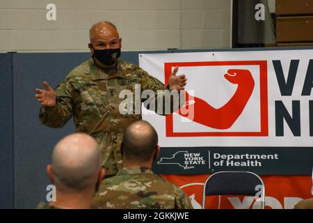 U.S. Army Major General Raymond F. Shields Jr., Adjutant General for the State of New York, addresses U.S. Army Soldiers at the Community Vaccination Center at York College in Queens, New York, May 18, 2021. York College CVC has administered more than 220,000 COVID-19 vaccinations since beginning operations in February. U.S. Northern Command, through U.S. Army North, remains committed to providing continued, flexible Department of Defense support to the Federal Emergency Management Agency as part of the whole-of-government response to COVID-19. Stock Photo