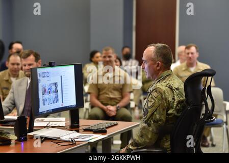 Lt. Gen. Eric Fick, F-35 Joint Program Executive Officer, speaks to virtual participants during an all-hands ceremony at the program headquarters in Arlington, Va. The F-35 Joint Program Office is the Department of Defense's focal point for the 5th generation strike aircraft for the Navy, Air Force, Marines, and our allies. The F-35 is the premier multi-mission, 5th generation weapon system. Its ability to collect, analyze and share data is a force multiplier that enhances all assets in the battle-space: with stealth technology, advanced sensors, weapons capacity, and range. The F-35, which ha Stock Photo