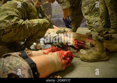 While conducting their annual training at Camp Ripley Training Center ...