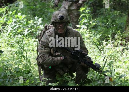 Soldiers of the 1st Battalion, 279th Infantry Battalion, conduct an ...