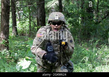 Soldiers of the 1st Battalion, 279th Infantry Battalion, conduct an ...