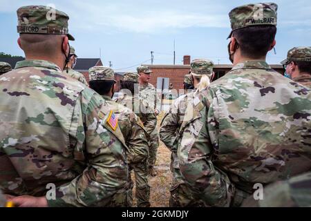 U.S. Army Soldiers with Bravo Company, 104th Brigade Engineer Battalion, New Jersey Army National Guard, stand in formation upon their return to the National Guard Armory in Hammonton, N.J., after completing the Capitol Response II mission, May 26, 2021. The New Jersey National Guard has been supporting Federal and District agencies with security, communications, medical evacuation, logistics, and safety support.