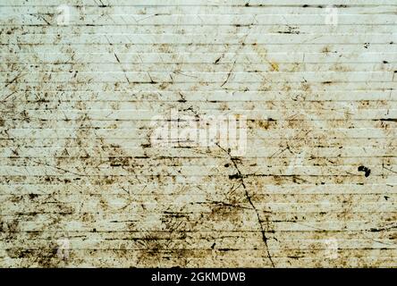 Rusty colored metal texture with cracked paint, grunge background Stock Photo