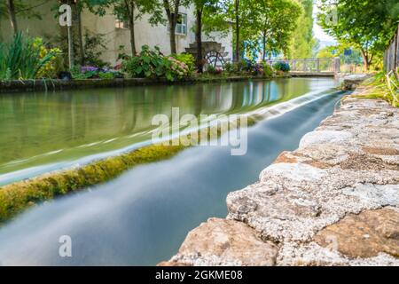 Water games in the village of the ancient mills. Stock Photo