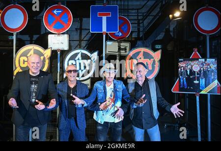 Berlin, Germany. 14th Sep, 2021. The musicians Manfred Hennig (l-r), Toni Krahl, Fritz Puppel and Georgi Gogow from the band City at a press event for the 50th anniversary in 2022. The band wants to say goodbye to their fans with several live concerts at the end of next year. A new double album and a book are planned for the anniversary year. Credit: Jens Kalaene/dpa-Zentralbild/dpa/Alamy Live News Stock Photo