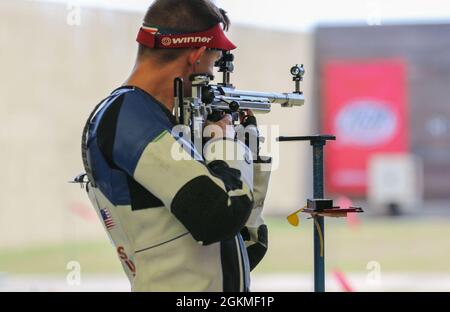 Sgt. Patrick Sunderman, a Farmington, Minnesota native who is a marksmanship instructor/competitive shooter for the U.S. Army Marksmanship Unit, earned a spot on Team USA's Men's 50m Smallbore Team after completing Part 2 of the Olympic Trials at Fort Benning, Georgia on May 26, 2021.     This Soldier claimed his Olympic berth with the combined score (from Part 1 and Part 2 Trials) of 4706-249x. The 50m Smallbore event is also referred to as Three Position rifle since the athletes must fire 40 rounds in the kneeling, prone and standing positions in two days of qualification rounds. Then, the t Stock Photo