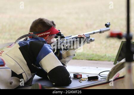 Sgt. Patrick Sunderman, a Farmington, Minnesota native who is a marksmanship instructor/competitive shooter for the U.S. Army Marksmanship Unit, earned a spot on Team USA's Men's 50m Smallbore Team after completing Part 2 of the Olympic Trials at Fort Benning, Georgia on May 26, 2021.     This Soldier claimed his Olympic berth with the combined score (from Part 1 and Part 2 Trials) of 4706-249x. The 50m Smallbore event is also referred to as Three Position rifle since the athletes must fire 40 rounds in the kneeling, prone and standing positions in two days of qualification rounds. Then, the t Stock Photo