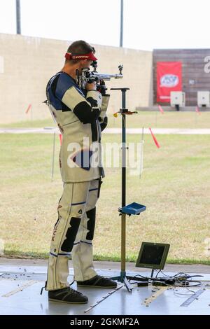 Sgt. Patrick Sunderman, a Farmington, Minnesota native who is a marksmanship instructor/competitive shooter for the U.S. Army Marksmanship Unit, earned a spot on Team USA's Men's 50m Smallbore Team after completing Part 2 of the Olympic Trials at Fort Benning, Georgia on May 26, 2021.     This Soldier claimed his Olympic berth with the combined score (from Part 1 and Part 2 Trials) of 4706-249x. The 50m Smallbore event is also referred to as Three Position rifle since the athletes must fire 40 rounds in the kneeling, prone and standing positions in two days of qualification rounds. Then, the t Stock Photo