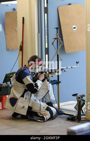 Sgt. Patrick Sunderman, a Farmington, Minnesota native who is a marksmanship instructor/competitive shooter for the U.S. Army Marksmanship Unit, earned a spot on Team USA's Men's 50m Smallbore Team after completing Part 2 of the Olympic Trials at Fort Benning, Georgia on May 26, 2021.     This Soldier claimed his Olympic berth with the combined score (from Part 1 and Part 2 Trials) of 4706-249x. The 50m Smallbore event is also referred to as Three Position rifle since the athletes must fire 40 rounds in the kneeling, prone and standing positions in two days of qualification rounds. Then, the t Stock Photo