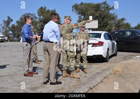 U.S. Army Corps of Engineers South Pacific Division Brig. Gen. Paul Owen indicates Corps' projects along the Los Angeles River, May 26, 2021, from Point Grand View in Elysium Park, Los Angeles. Owen was accompanied by Los Angeles District commander Col. Julie Balten and her team. Stock Photo