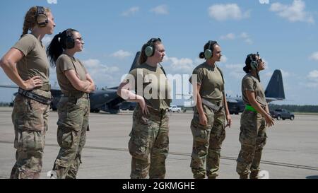 Air Commandos from the 1st Special Operations Maintenance Group prepare to launch an AC-130J Ghostrider gunship at Hurlburt Field, Florida, May 26, 2021. The 1st Special Operations Group conducted the first-ever all-female AC-130J Ghostrider gunship flight, consisting of female Air Commandos from the operations, maintenance and support functions and an all-female aircrew. Stock Photo