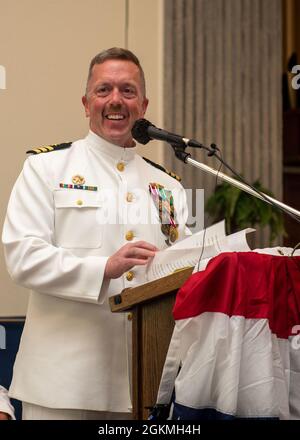 KINGS BAY, Ga., (May 27, 2021)  Cmdr. Jason Anderson delivers remarks at the change of command ceremony for the Ohio-class ballistic-missile submarine USS Rhode Island (SSBN 740) (Gold). Cmdr. David Burke relieved Anderson as the commanding officer of Rhode Island Gold crew. Rhode Island is one of six ballistic-missile submarines stationed at the base and is capable of carrying up to 20 submarine-launched ballistic missiles with multiple warheads. Stock Photo