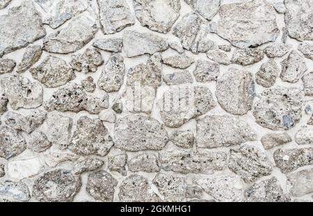 Close up of small rough  pebbles background texture Stock Photo
